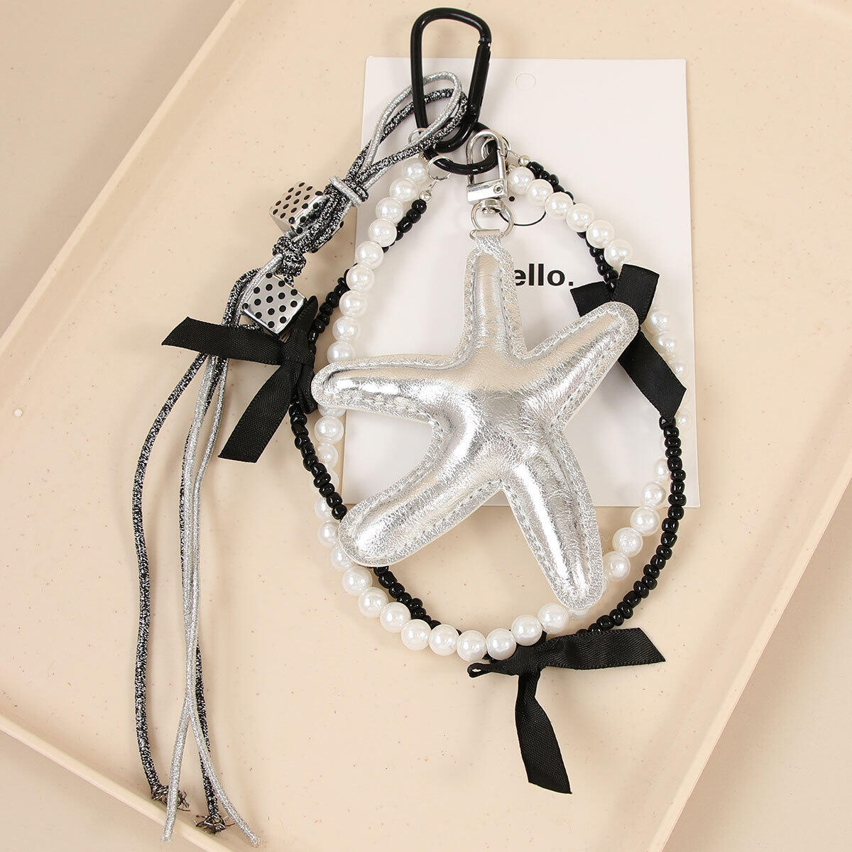 1 Stück einfache leichte Luxus-Stern-Taschenanhänger für Damen Bild4