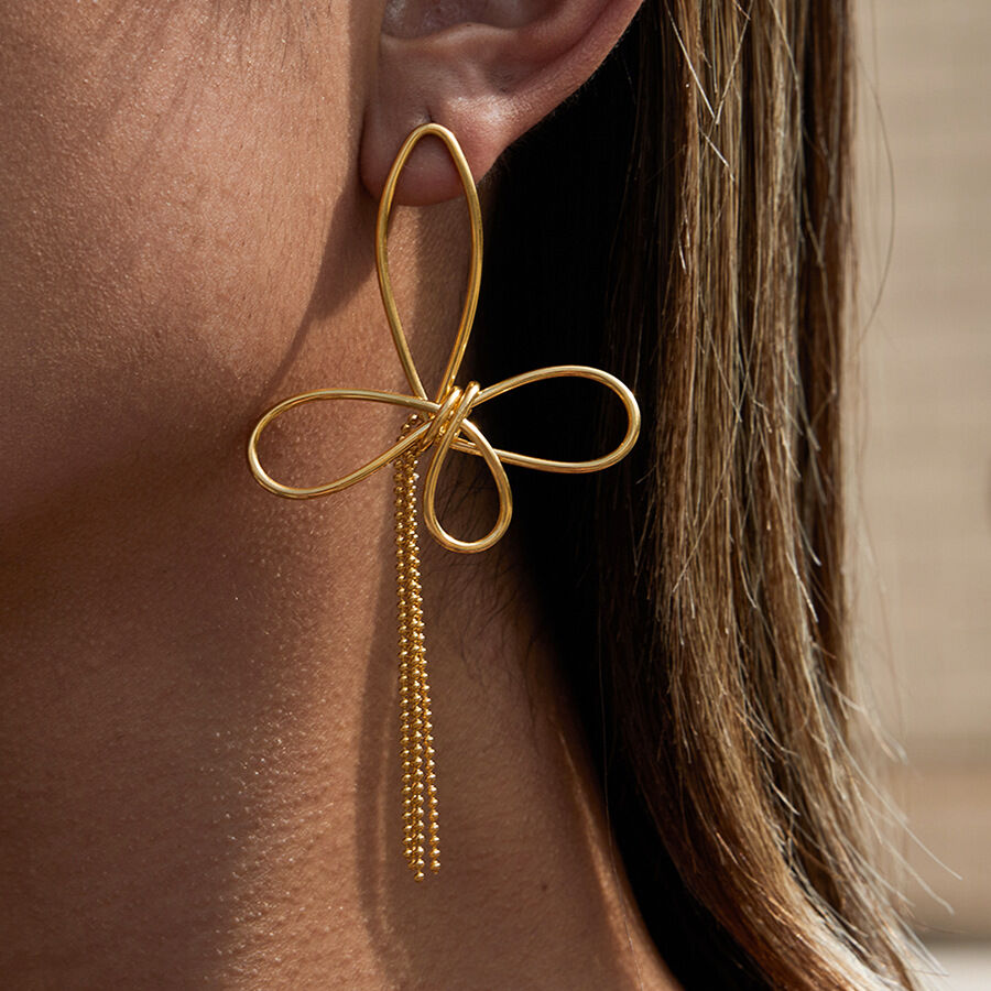 1 paire de magnifiques boucles d'oreilles pendantes pour femme, en acier inoxydable doré, avec nœud papillon et pompon. 2