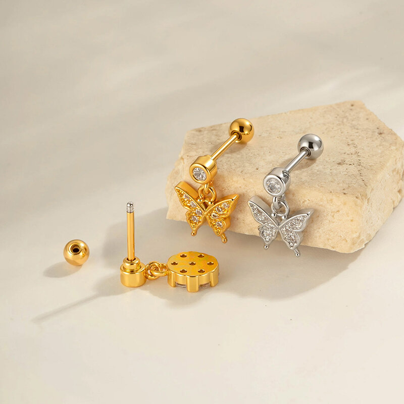 1 pendiente de mariposa con circonitas de color cobre y dorado. h5 Imagen3
