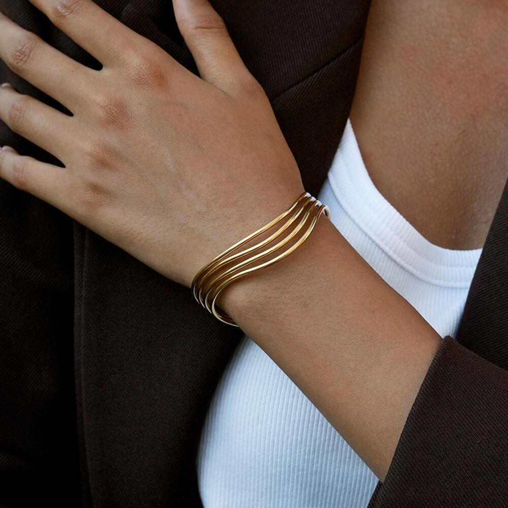 1 stuk klassieke, golvende, waterdichte, goudkleurige damesarmband van roestvrij staal