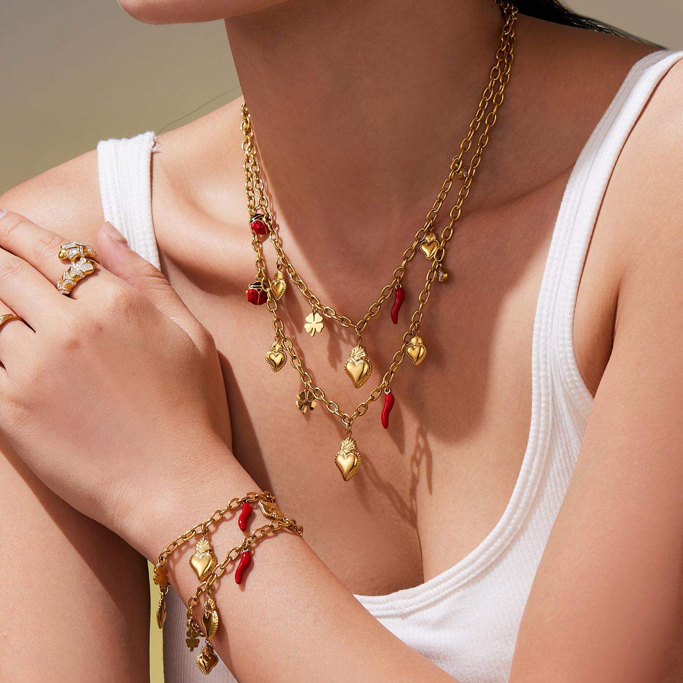 Lussuosi set di gioielli da donna in acciaio inossidabile color oro con cuore e peperoncino
