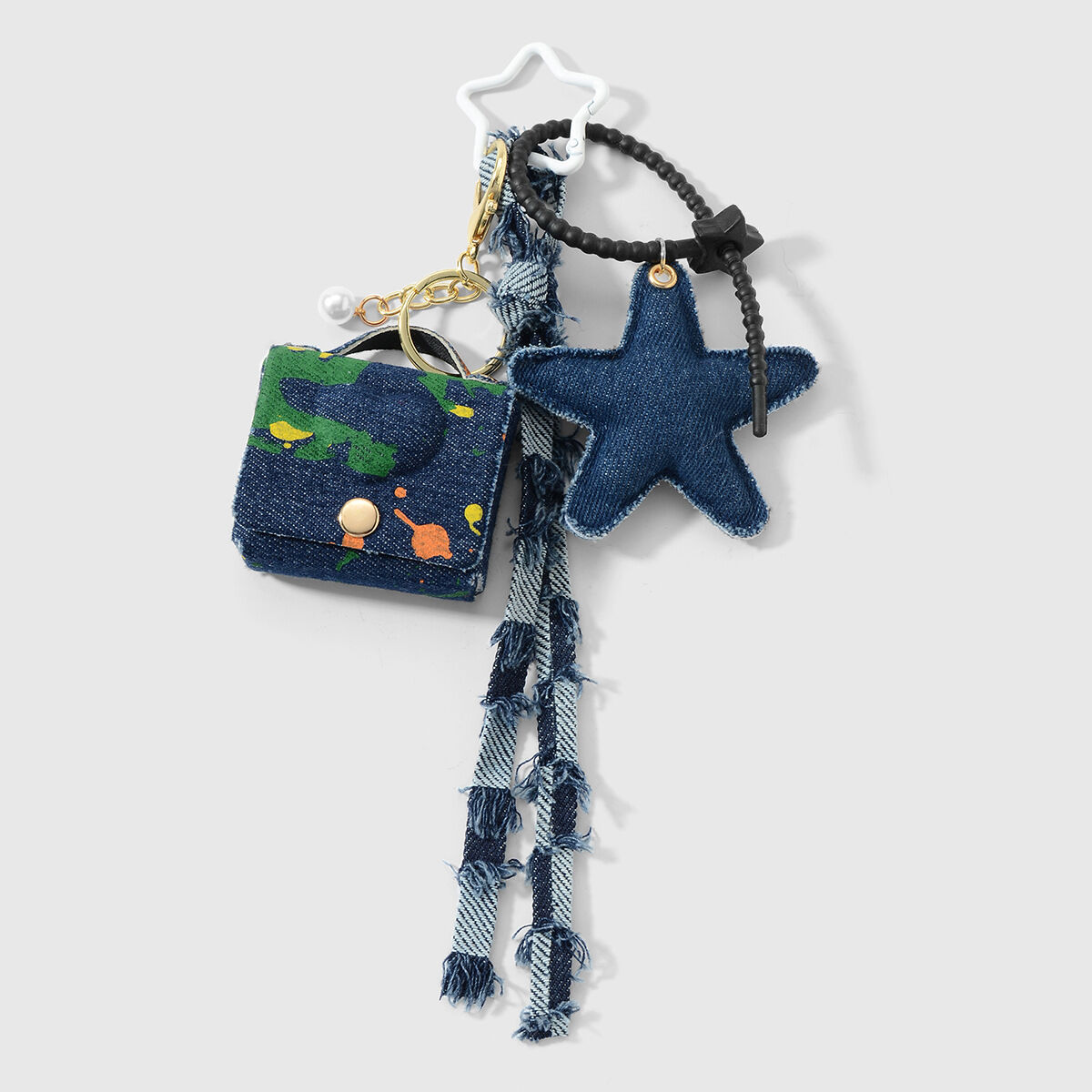1 dunkelblauer kleiner Taschenstern-Schlüsselanhänger 