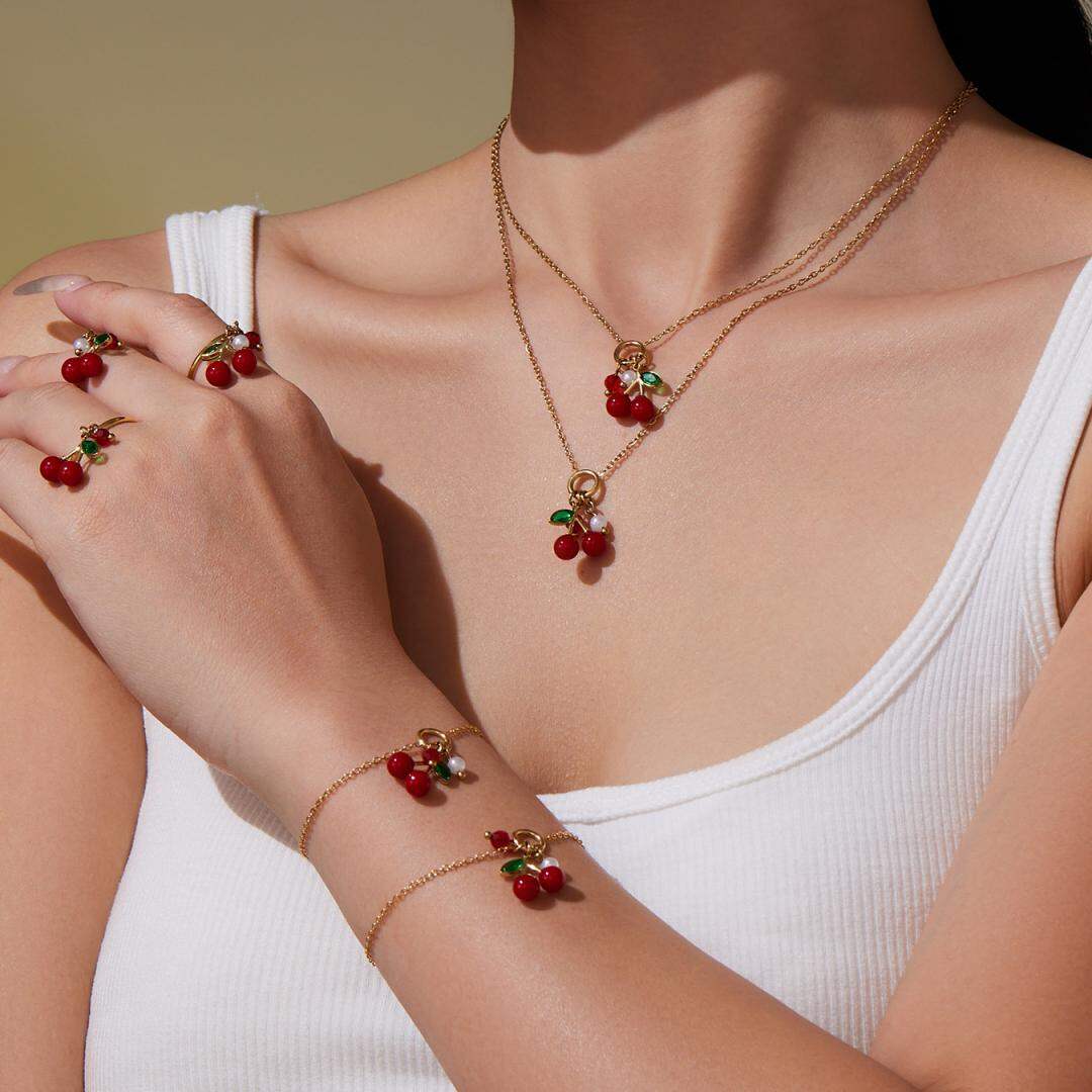 Verspieltes Kirsch-Edelstahl-Schmuckset für Damen, wasserdicht, goldfarben, mit Zirkonia