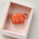 Orange/Airpods 3