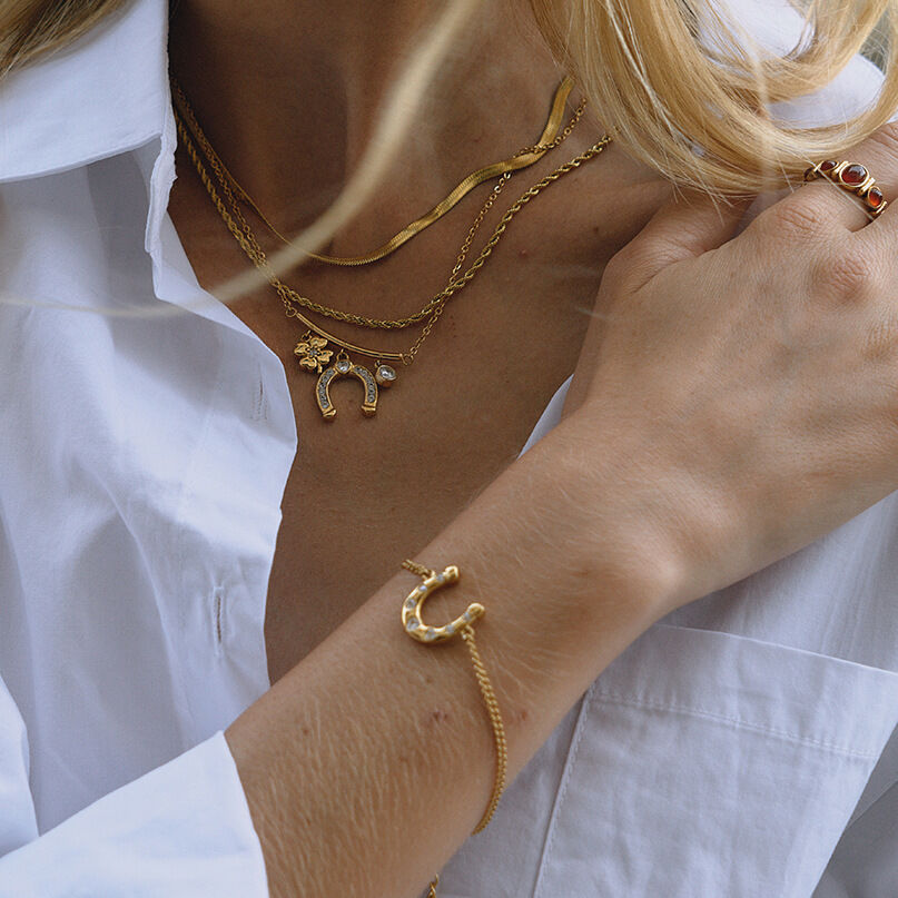 Luxuriöses, hufeisenförmiges Schmuckset aus wasserdichtem Edelstahl in Goldfarbe mit Zirkonia für Damen