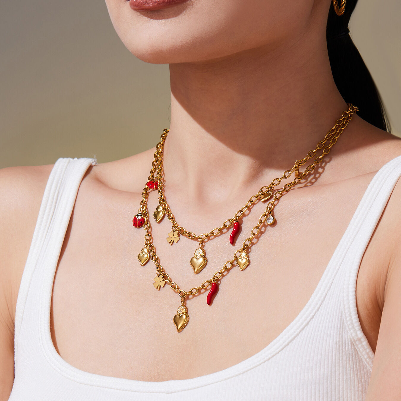 Lussuosi set di gioielli da donna in acciaio inossidabile color oro con cuore e peperoncino 2