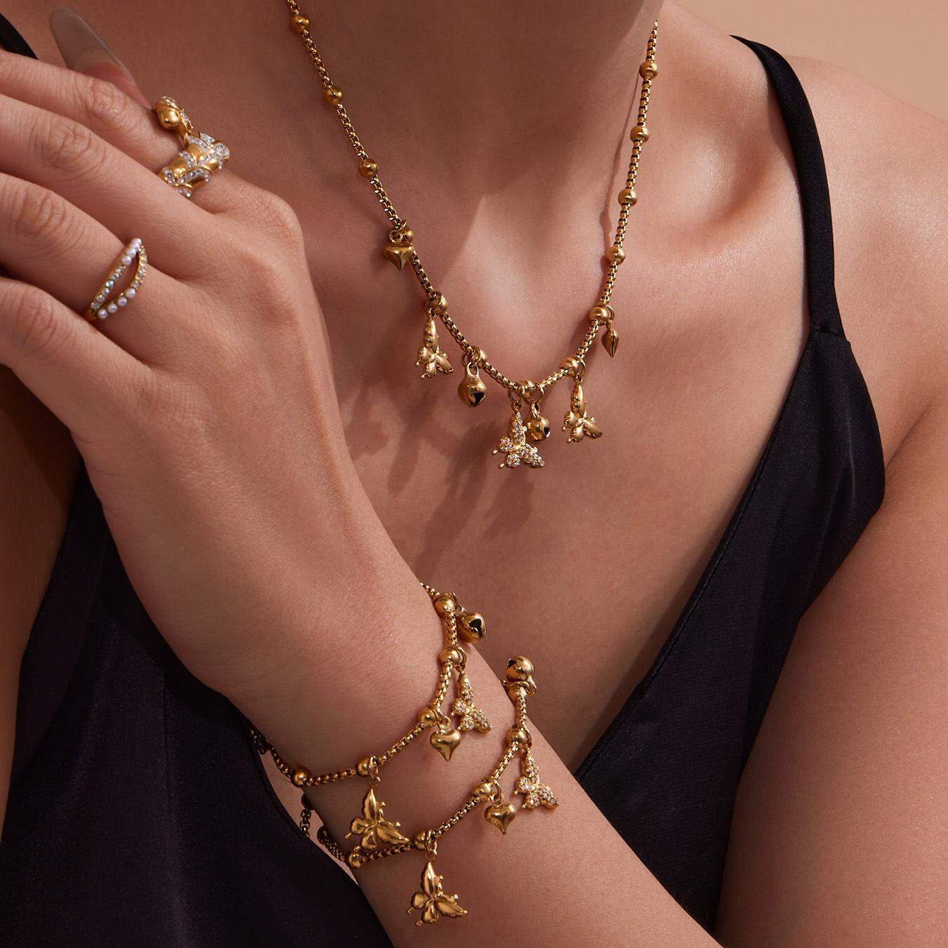 Elegante Schmetterlings-Schmucksets aus Edelstahl, wasserdicht, goldfarben, mit Zirkonia