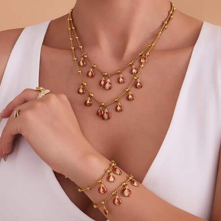 Exquisite Beetle roestvrijstalen waterdichte sieradenset met goudkleurige zirkonia voor dames
