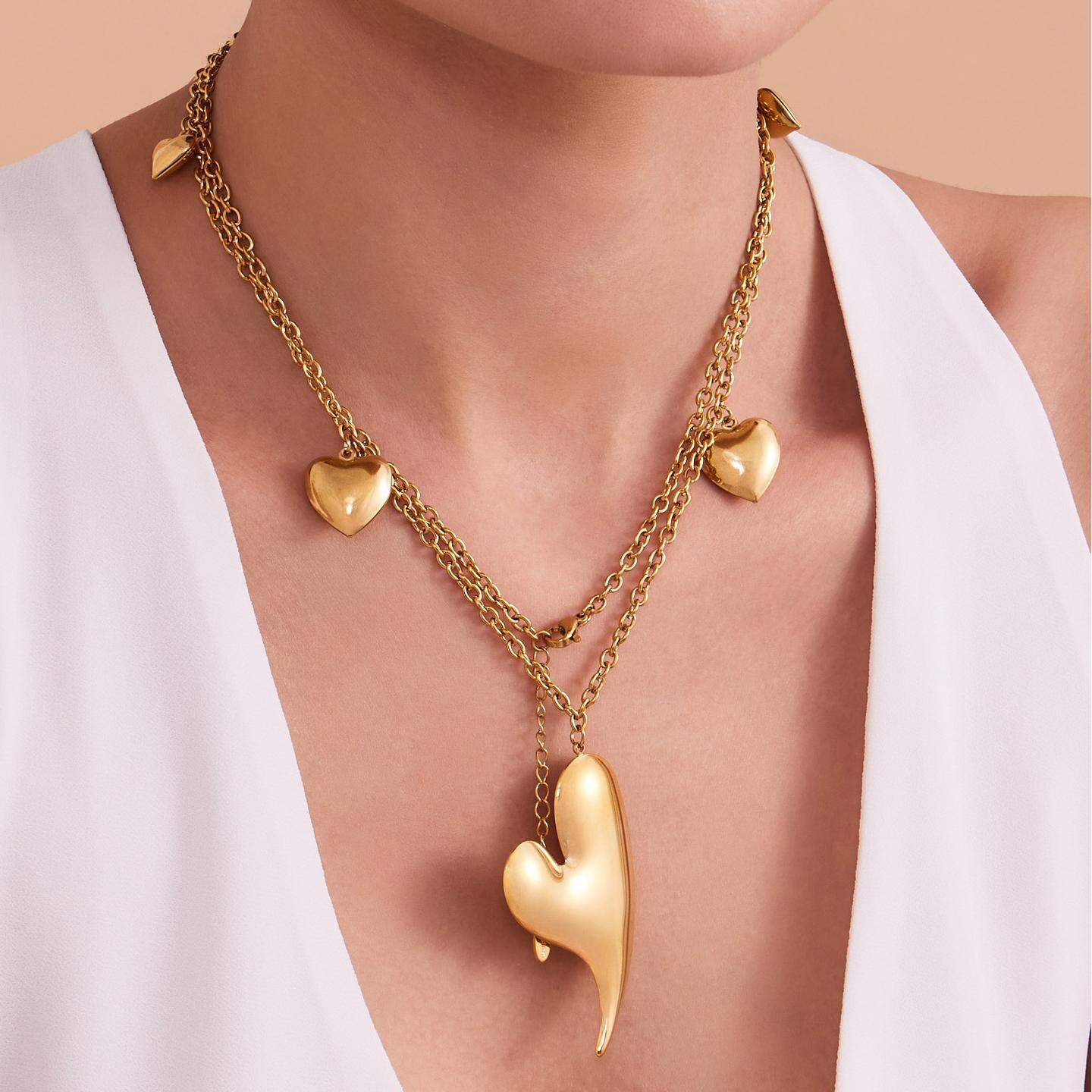 Collares largos clásicos de acero inoxidable con forma de corazón irregular, resistentes al agua y color dorado para mujer.