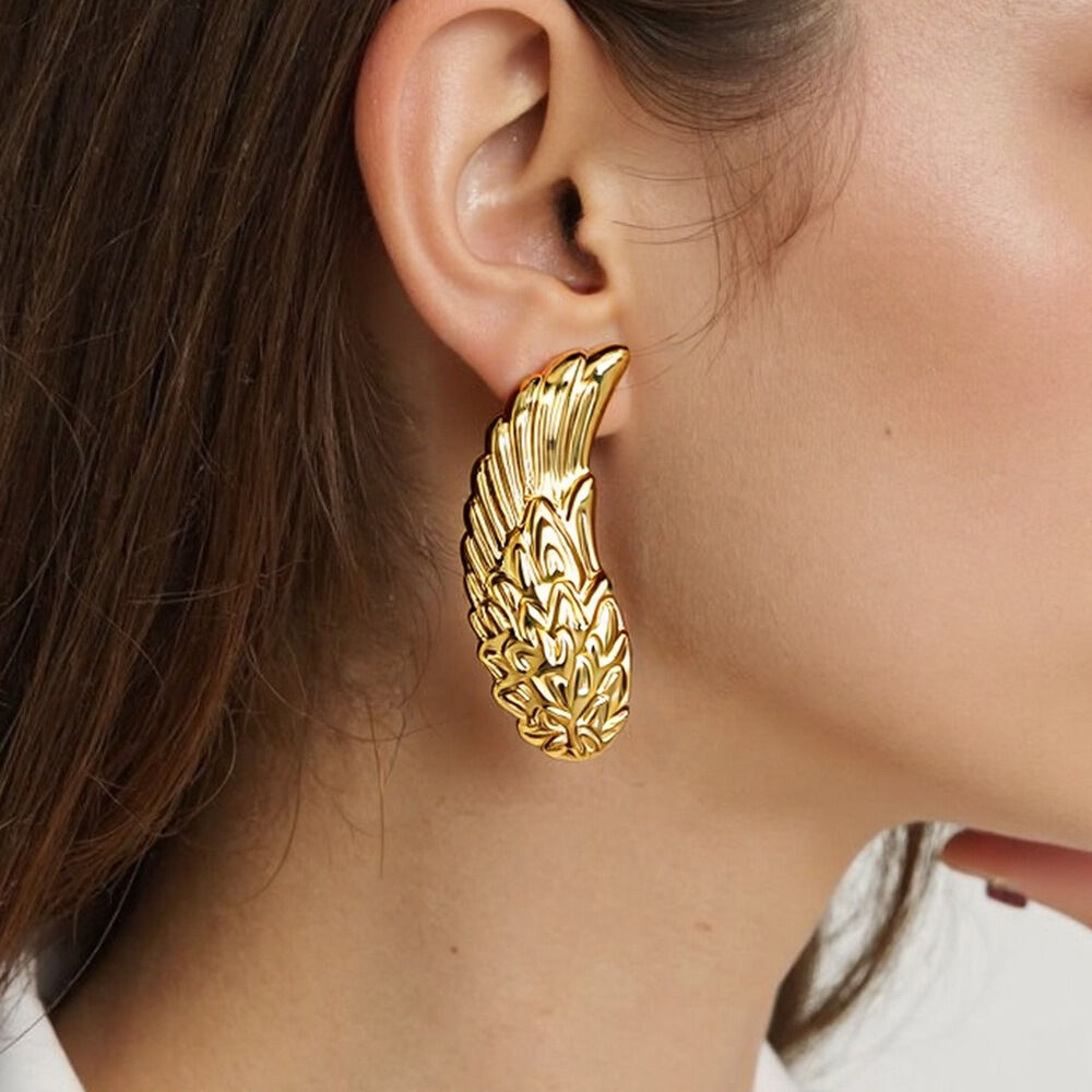 1 paio di orecchini a bottone color oro impermeabili in acciaio inossidabile con ali punk