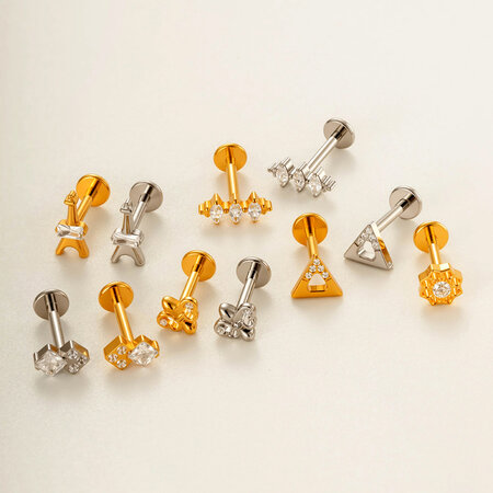1 pezzo semplice orecchini da piercing da donna in lega di titanio color oro con zirconi