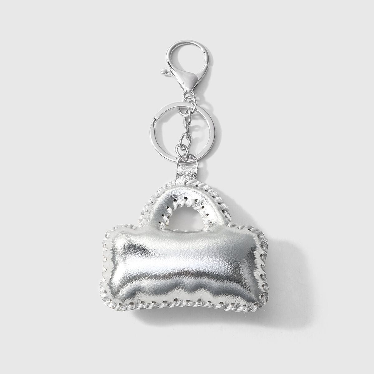 1 Small Silver Bag With Silver Buckle Pendant Picture2