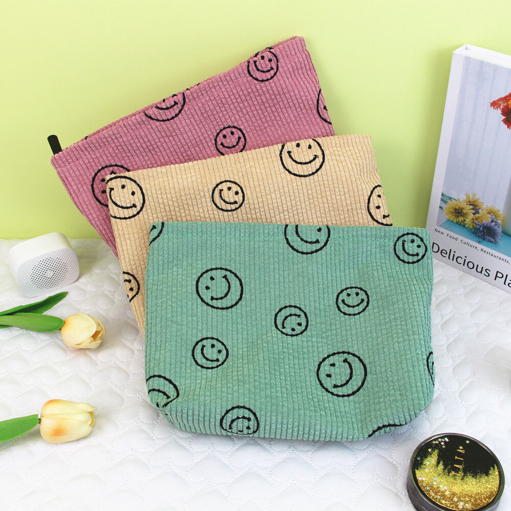 Neceser de maquillaje de pana con carita sonriente (1 unidad)