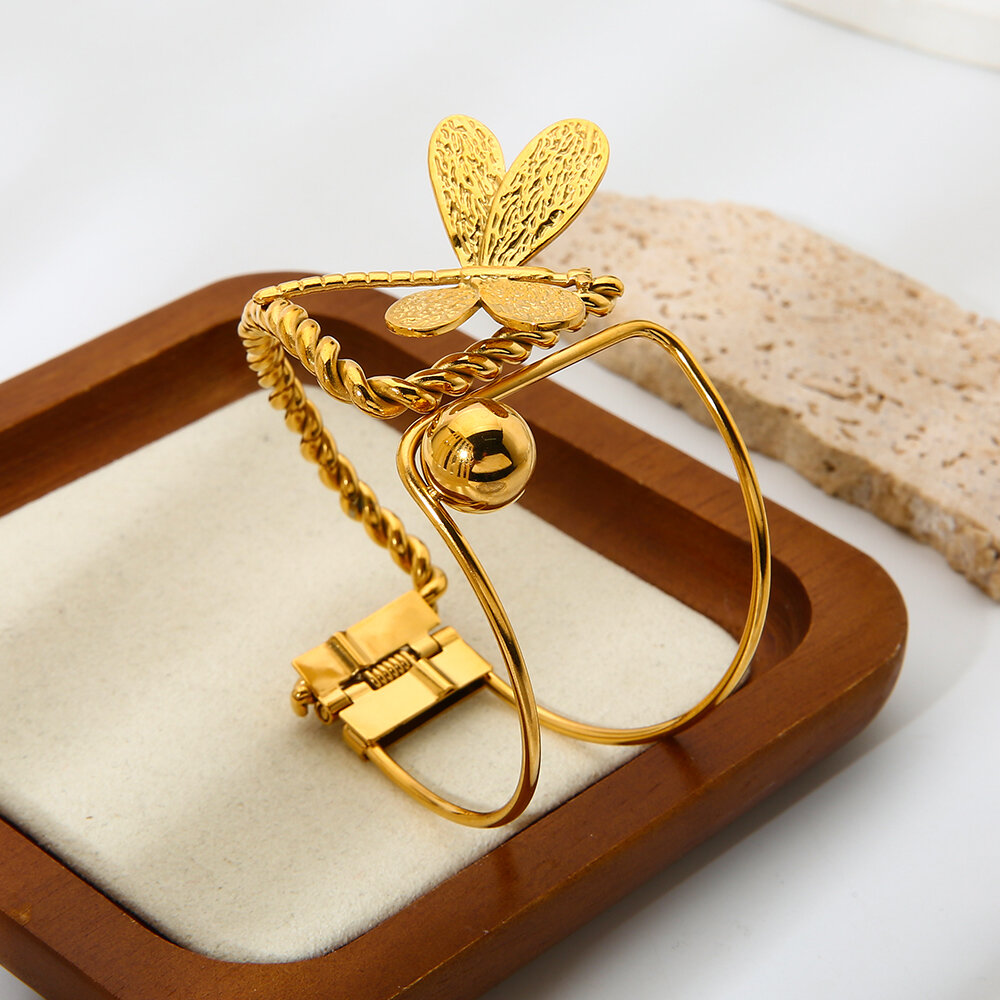 1 brazalete lujoso y elegante de acero inoxidable con forma irregular de libélula, resistente al agua, para mujer. Imagen7