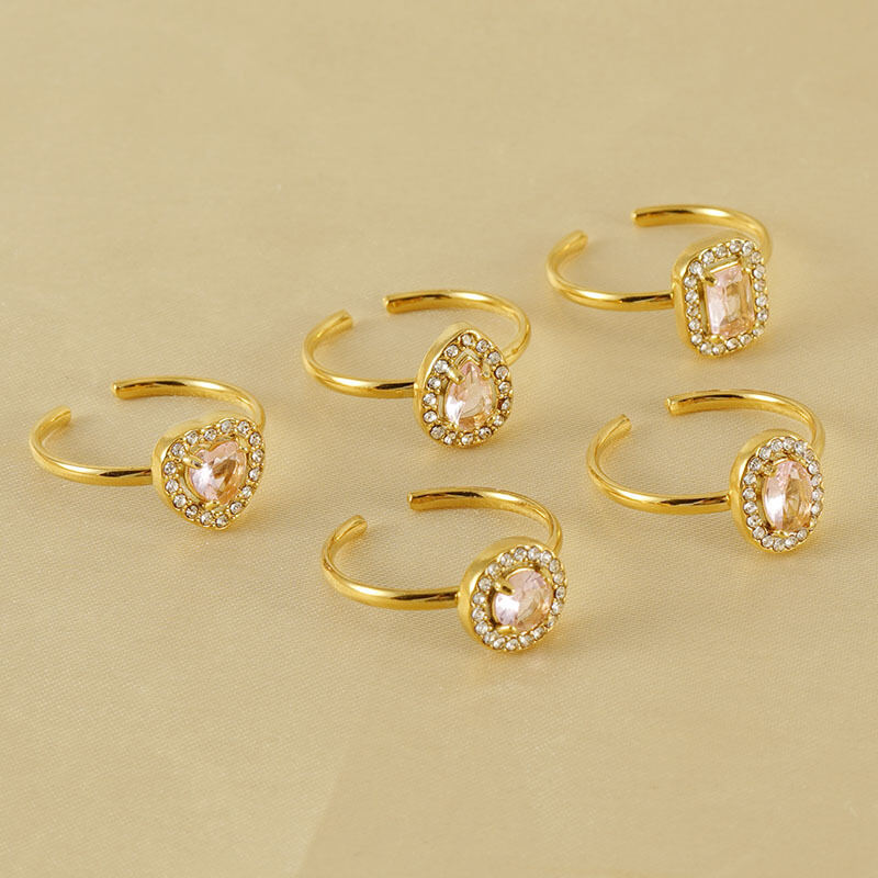 Anillos de mujer con piedras preciosas de circonita color dorado, resistentes al agua y de acero inoxidable con forma de gota brillante