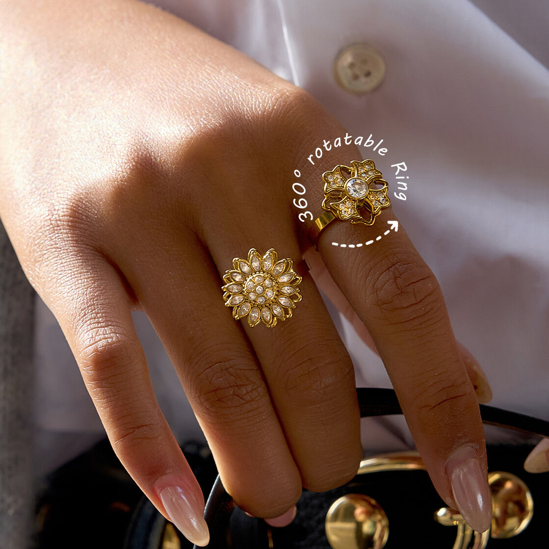Anillos llamativos de acero inoxidable con diseño de flor giratoria, resistentes al agua y color dorado. 2
