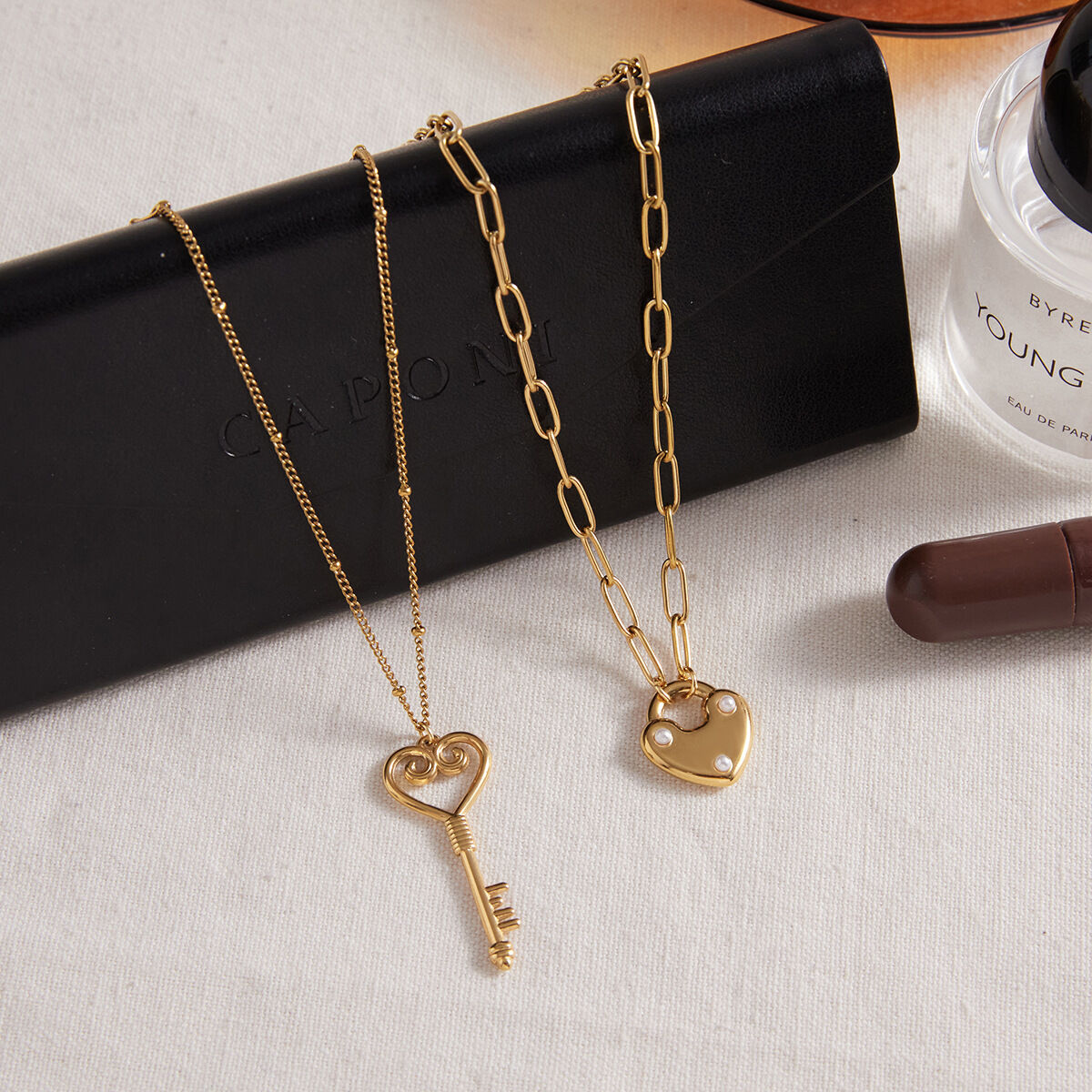 Collane con ciondolo da donna in acciaio inossidabile con chiave a forma di cuore romantico, impermeabili e anti-ossidazione, color oro h5 Immagine6
