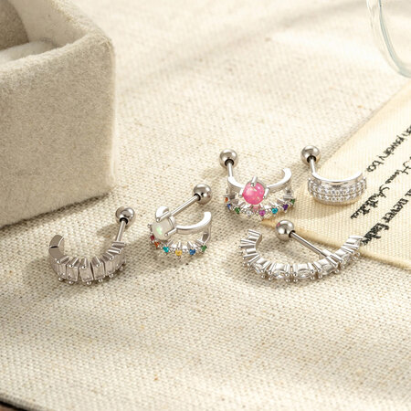 Delicate oorbellen voor dames met stervormige koperen en gouden zirkonia. 2