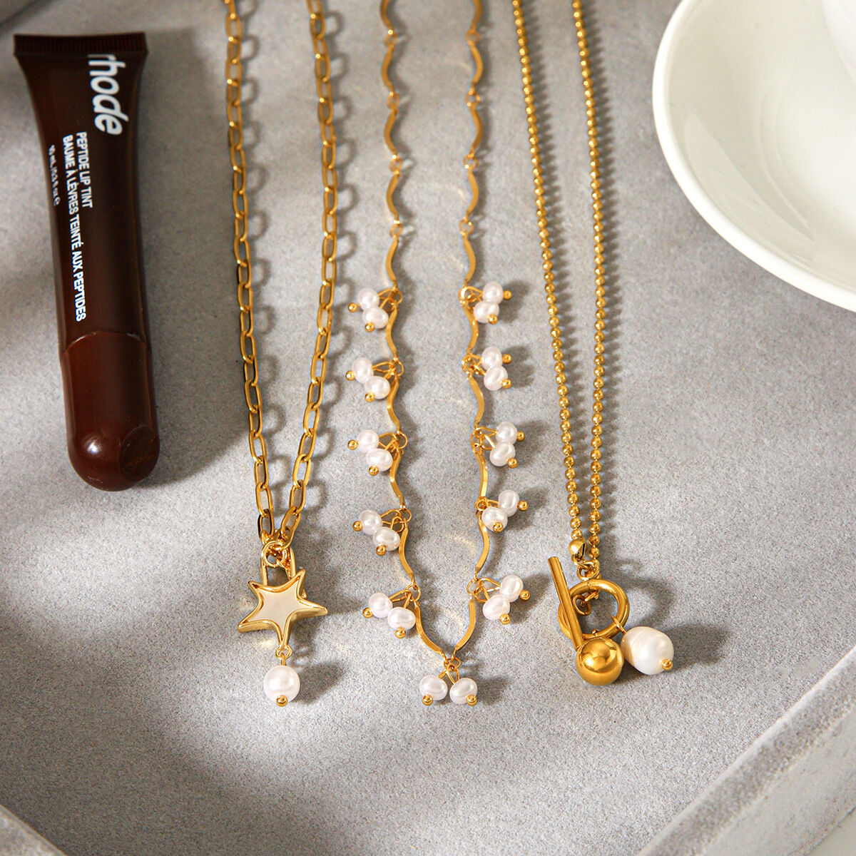 Collana con ciondolo di perle color oro impermeabile in acciaio inossidabile a forma di stella semplice 2