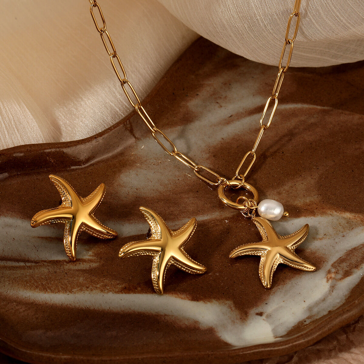 Set di collane da donna impermeabili in acciaio inossidabile color oro a forma di stella marina per le vacanze