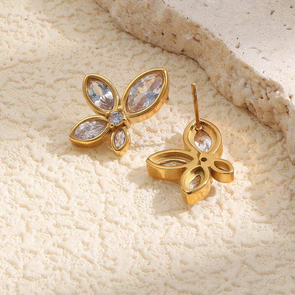 Blumenförmige, wasserdichte Ohrstecker aus Edelstahl in Goldfarbe mit Zirkonia für Damen Bild4