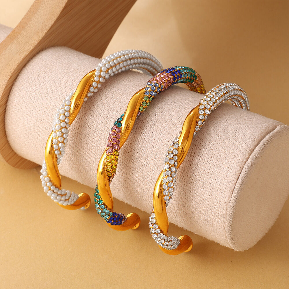 Pulseras de mujer de acero inoxidable con diseño circular diario, resistentes al agua, con diamantes de imitación de color dorado y perlas artificiales.