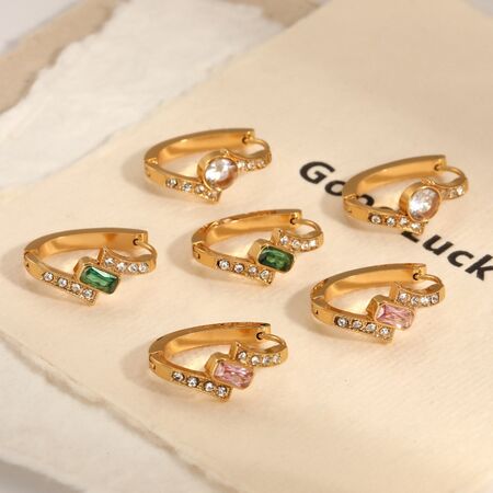Casual ronde, waterdichte, roestvrijstalen oorringen met goudkleurige strass-steentjes voor dames.