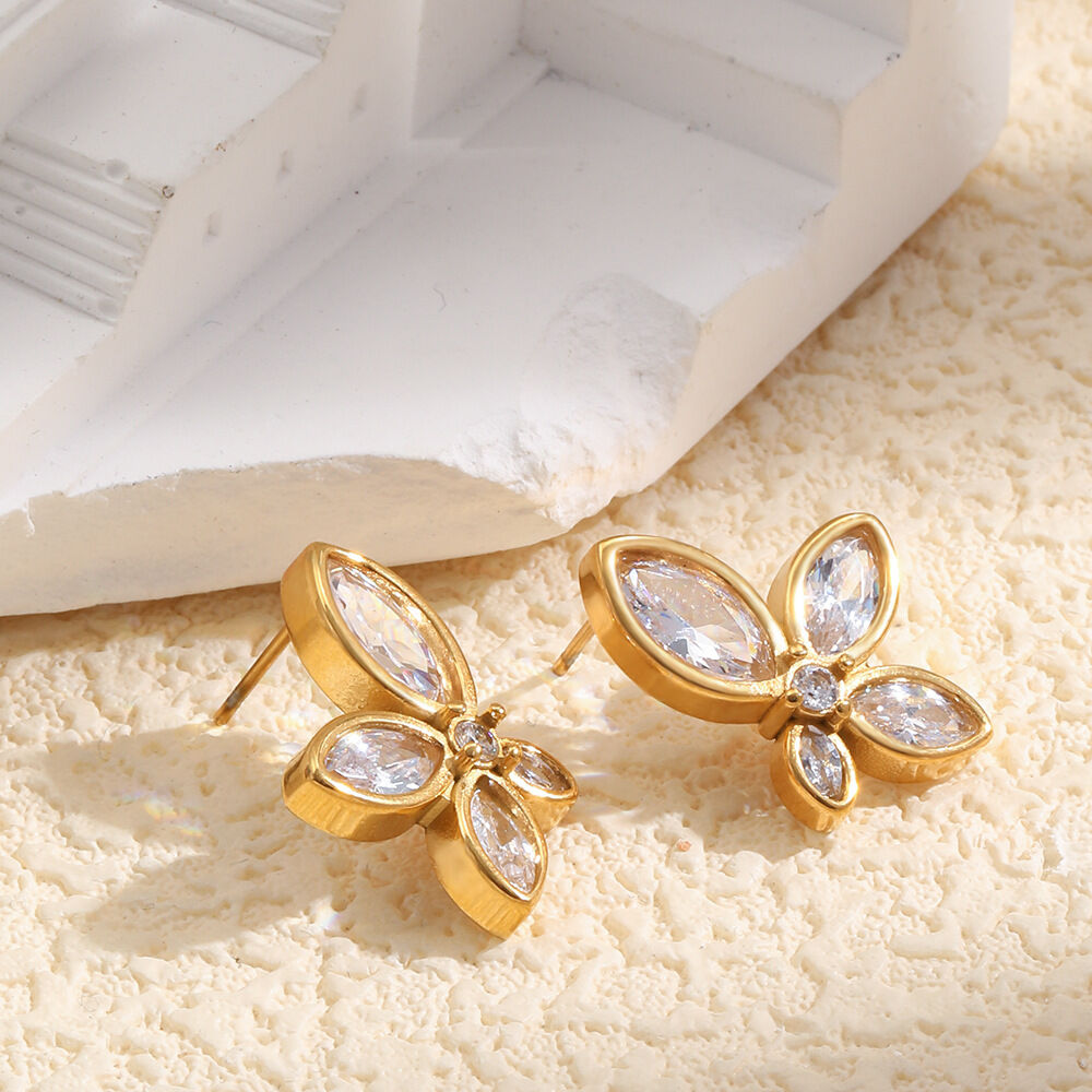 Blumenförmige, wasserdichte Ohrstecker aus Edelstahl in Goldfarbe mit Zirkonia für Damen Bild3