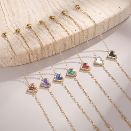 Pulseras de cadena para mujer estilo retro con diseño de corazón, de acero inoxidable, resistentes al agua y color dorado. 2