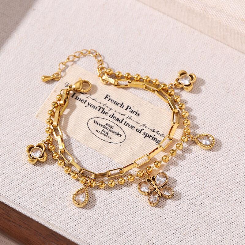 Bracelet à breloques pour femme en acier inoxydable, orné de fleurs, de cœurs et de papillons, étanche, avec zircon doré Image3