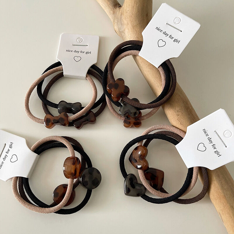Elastici per capelli Simple Series Classic Flower Heart Bow Nodo in tessuto con stampa leopardata