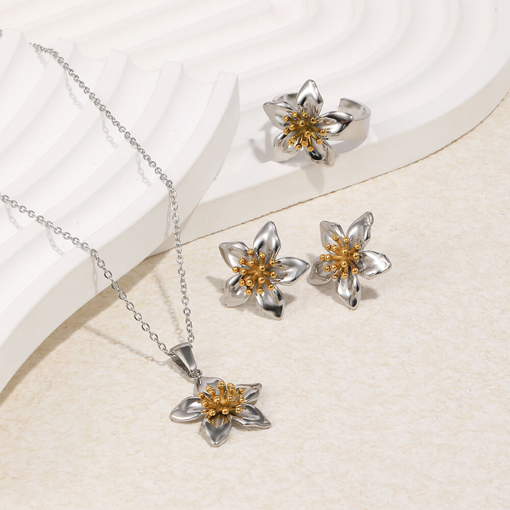 Ensembles de bijoux pour femmes en acier inoxydable doré, étanches, avec motif floral classique mêlant or et argent.