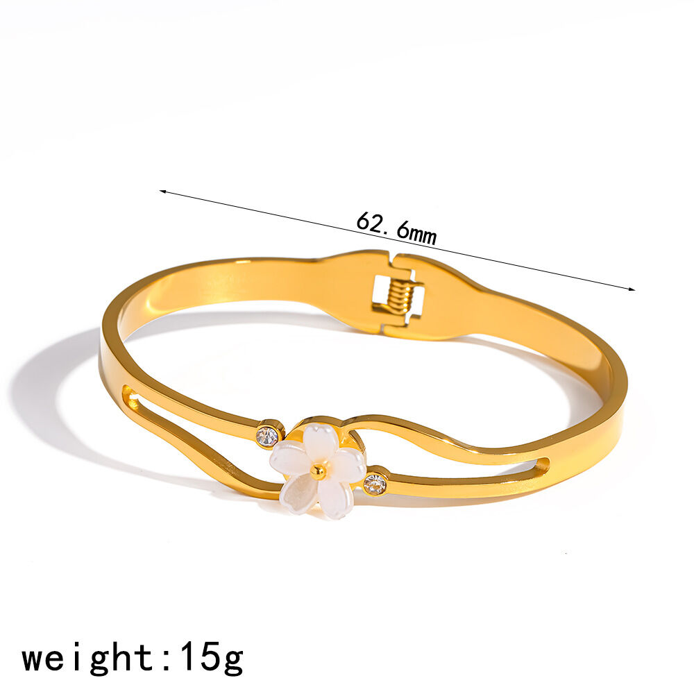Bracciale da donna in acciaio inossidabile color oro, impermeabile, con strass e perle artificiali, a forma di fiore naturale.