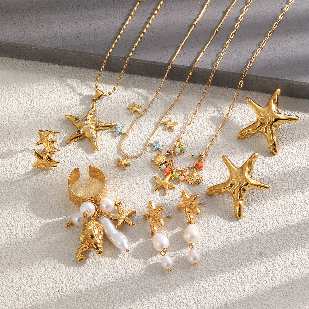 Urlaubs-Set im ozeanischen Stil: Seestern-Halskette aus wasserdichtem Edelstahl in Goldfarbe mit Strass und Perlen h5 Bild3