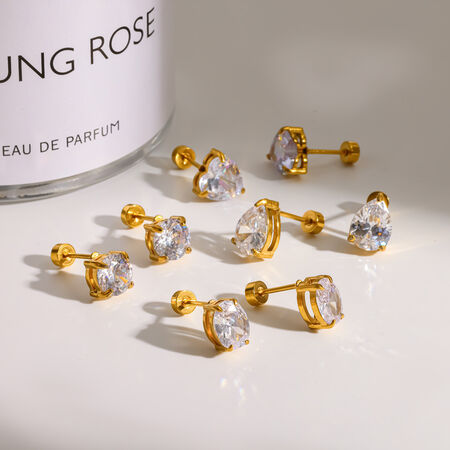 Eenvoudige, waterdichte oorbellen van roestvrij staal met gouden strass-steentjes voor dames.