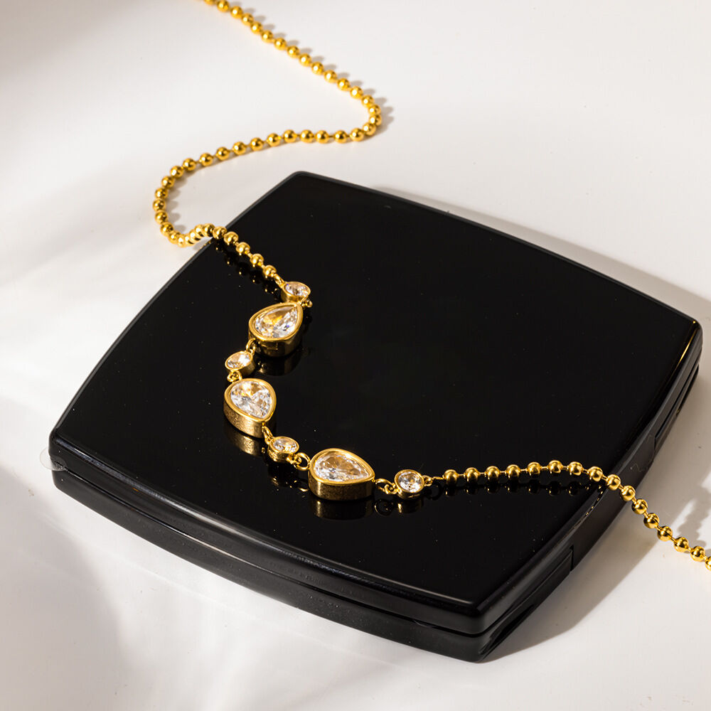 Collares con colgante de circonita color oro, elegantes y con forma de gota, de la serie Luxury Series, fabricados en acero inoxidable y resistentes al agua. h5Imagen3