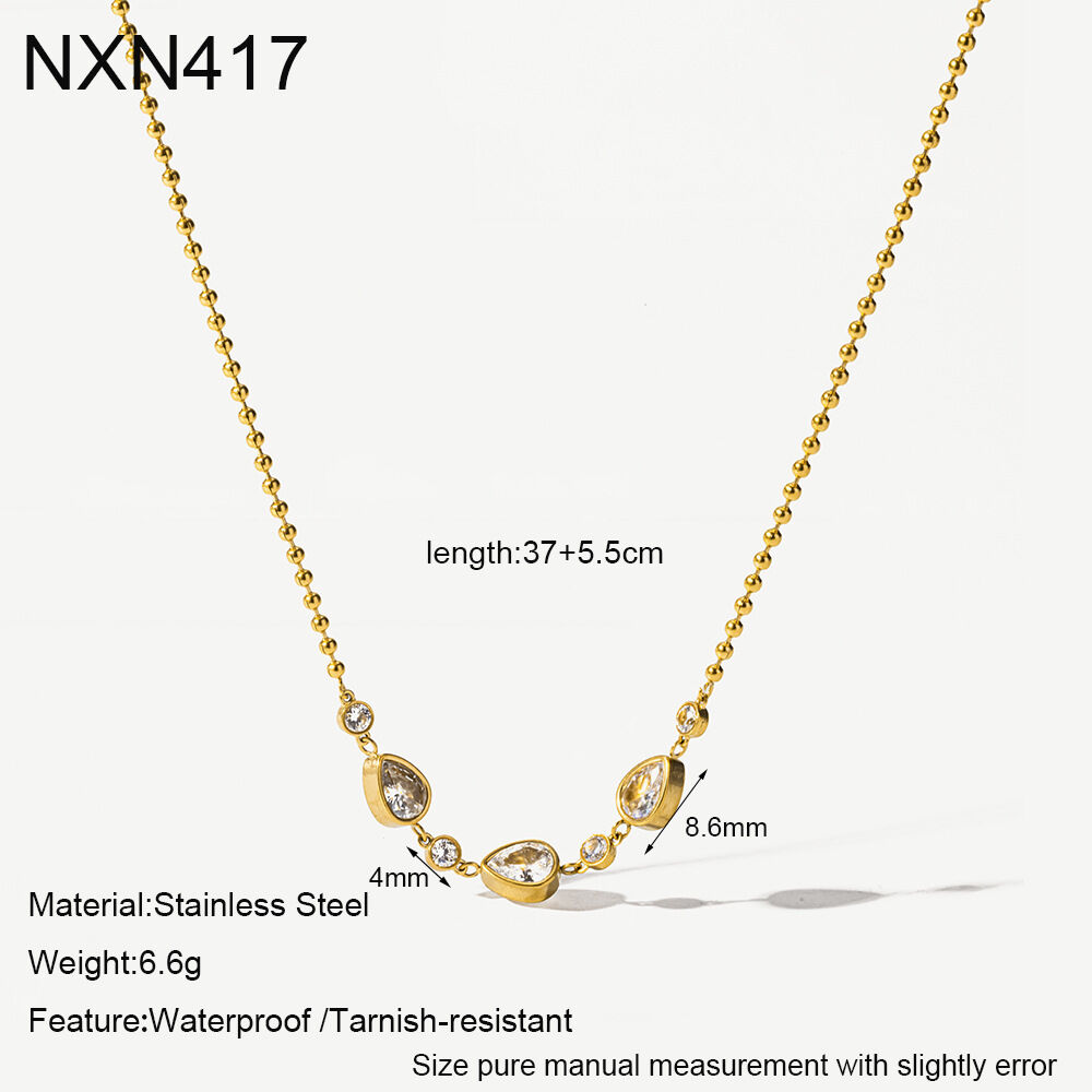 Collares con colgante de circonita color oro, elegantes y con forma de gota, de la serie Luxury Series, fabricados en acero inoxidable y resistentes al agua.