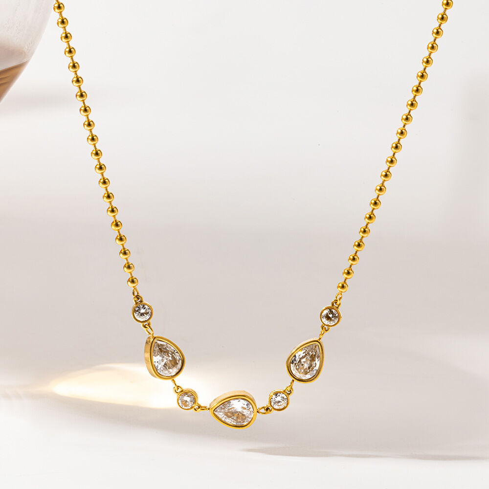 Collares con colgante de circonita color oro, elegantes y con forma de gota, de la serie Luxury Series, fabricados en acero inoxidable y resistentes al agua. 2