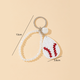 White baseball-shaped pendant