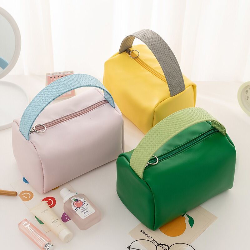 Bolsas de maquillaje sencillas de color liso para uso diario de PU