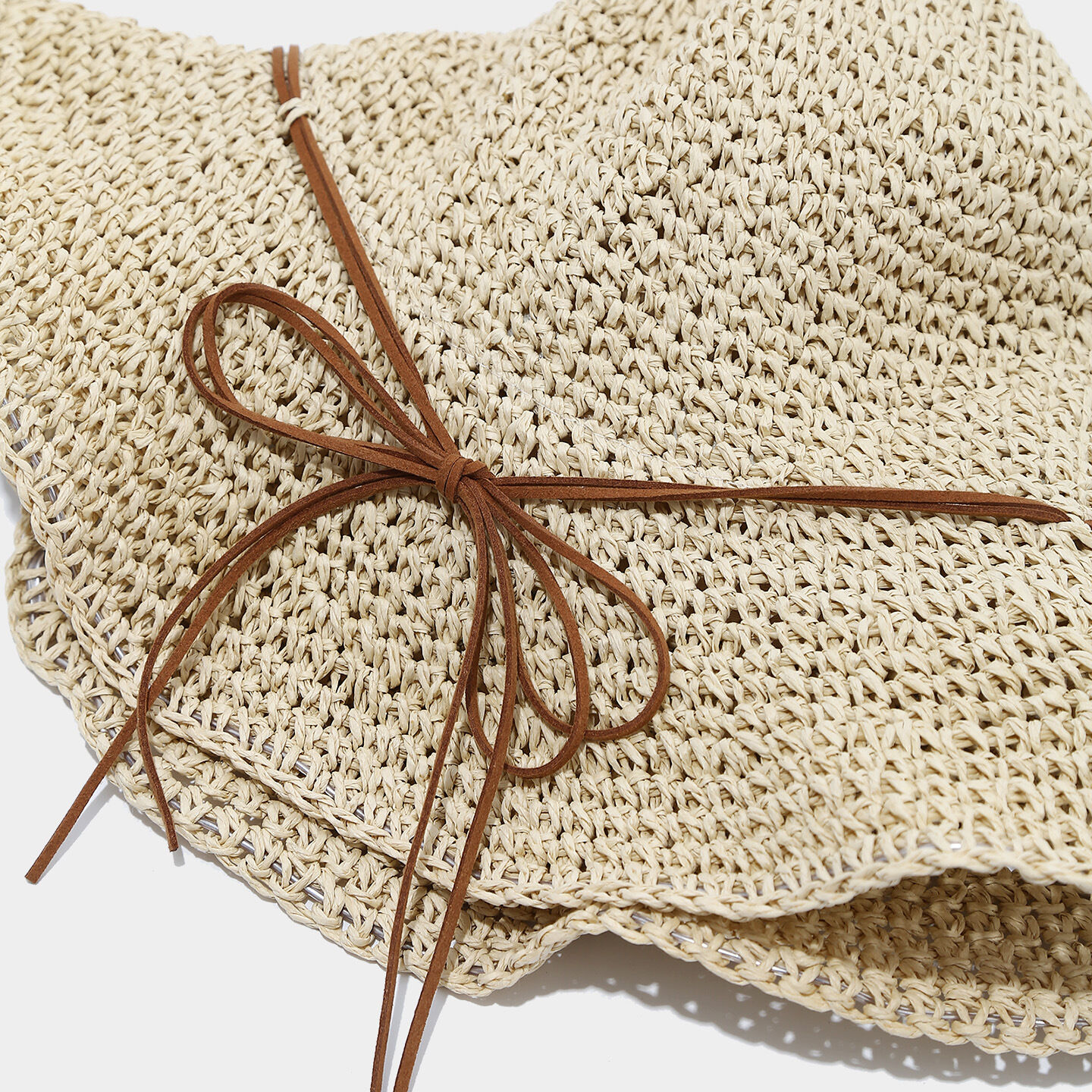 Simple Series Vacation Bow Knot Solid Color Hollowed-Out Woven Raffia Straw Hats h5 Picture3