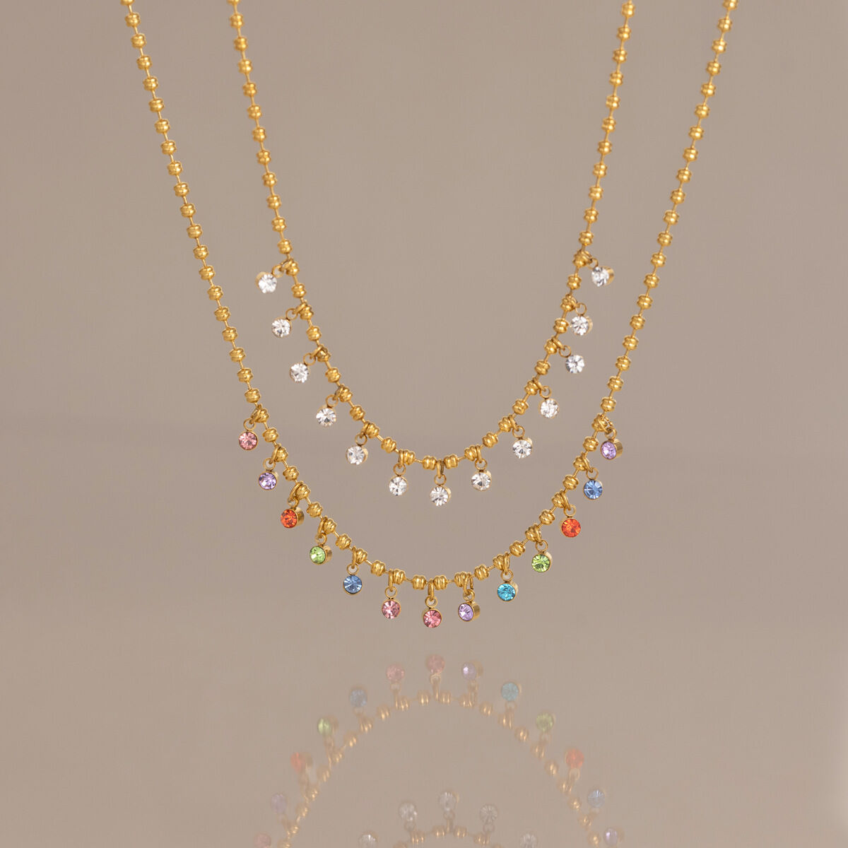 Collana con pendente da donna in acciaio inossidabile impermeabile color oro con zirconi h5 Immagine3