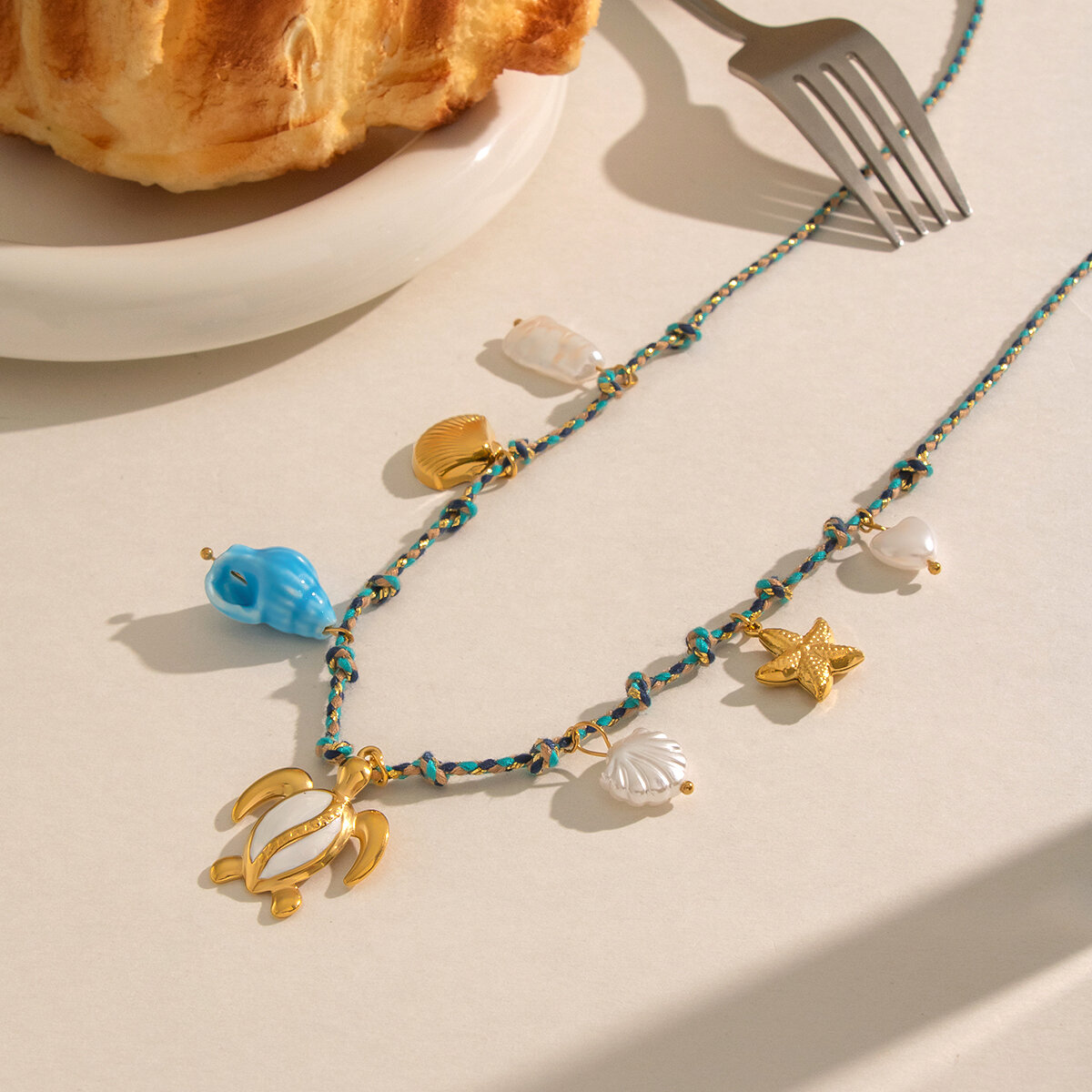 Romantische, geflochtene Damenhalskette aus Edelstahl mit ozeanischem Seesternmotiv, wasserdicht, goldfarben Bild5