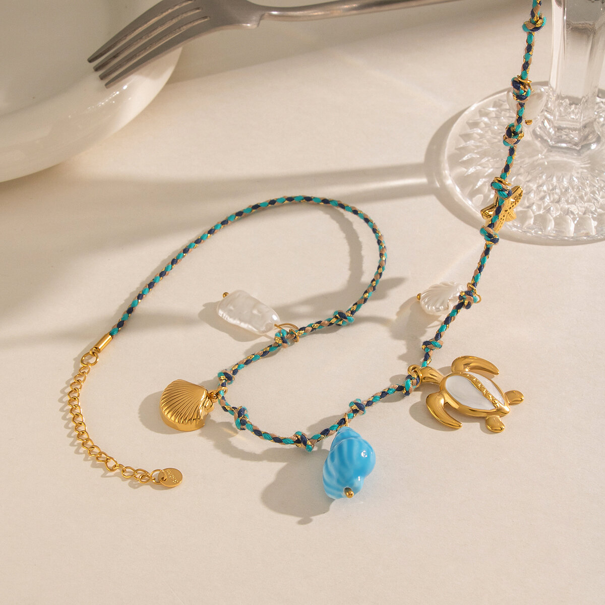 Romantische, geflochtene Damenhalskette aus Edelstahl mit ozeanischem Seesternmotiv, wasserdicht, goldfarben Bild3