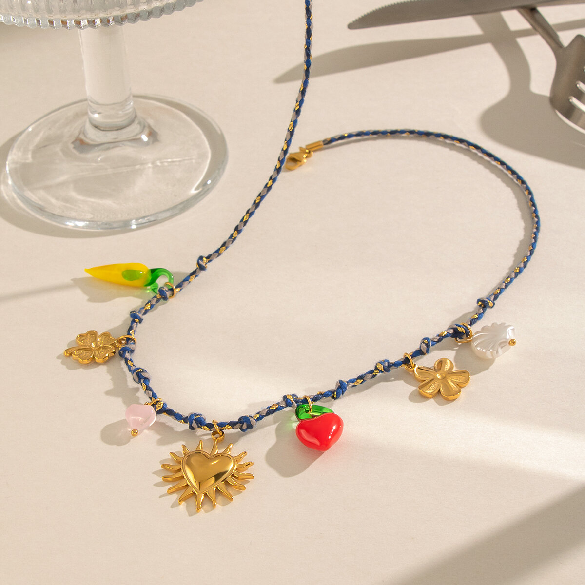 Hartvormige, waterdichte, geglazuurde, gevlochten damesketting van roestvrij staal met fruitmotief. Afbeelding4