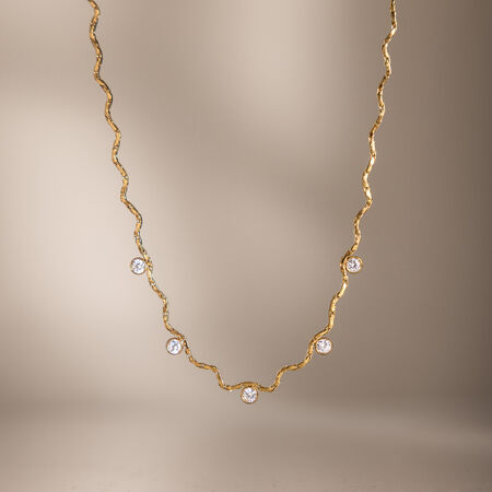 Eenvoudige, waterdichte roestvrijstalen damesketting met goudkleurige zirkonia.