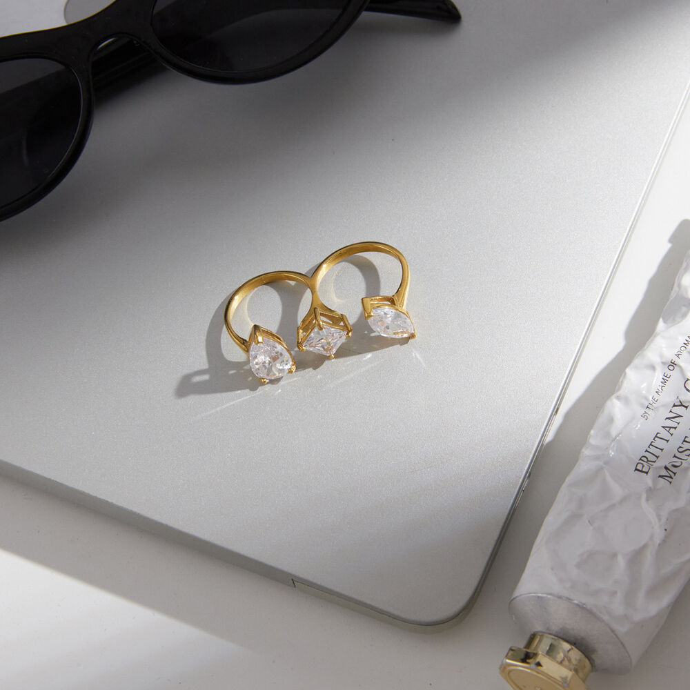 Luxe serie elliptische, waterdichte, roestvrijstalen damesringen met goudkleurige zirkonia. Afbeelding5