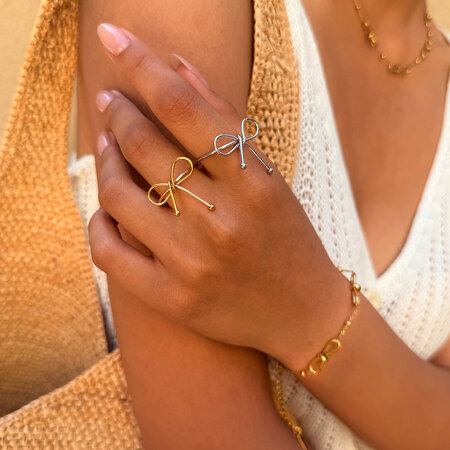 Einfacher Ring aus Edelstahl mit Schleifenknoten, wasserdicht, goldfarben 2
