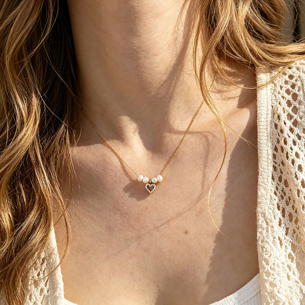 Collana da donna con ciondolo a forma di fiore, cuore, in acciaio inossidabile, impermeabile, color oro, con strass. h5Immagine2