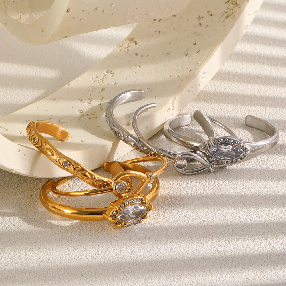 Pulseras de puño de lujo para mujer, de acero inoxidable con forma elíptica, resistentes al agua y de color dorado con circonitas. Imagen2